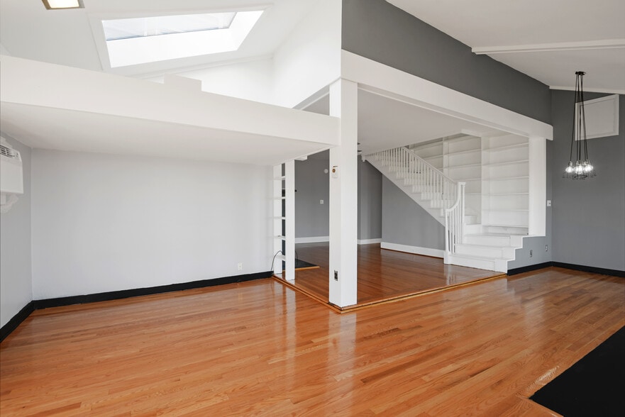 loft second bedroom with skylight - 1301 Rogers Rd