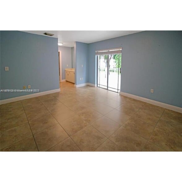 Building Photo - 10953 W Okeechobee Rd