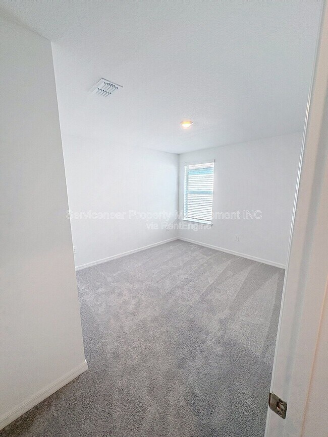 Building Photo - 8438 Blue Wave Ln E