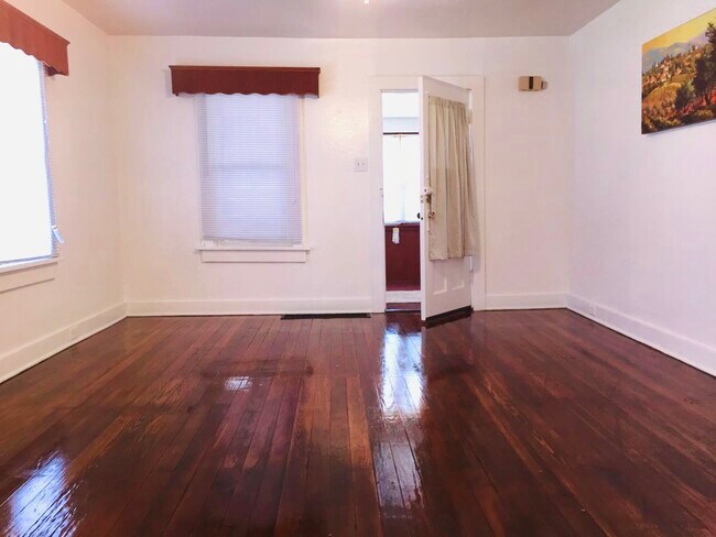 From enclosed porch to living room - 3025 Crescent Ave