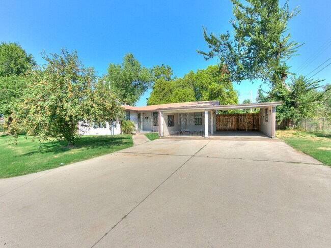 Building Photo - 9706 N Garnett Dr