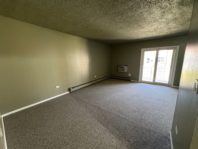 Building Photo - Charming 2BR Condo in Denver