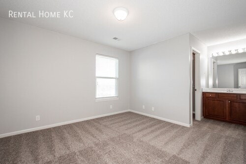 Building Photo - 2-bed, 2.5-bath 2-story Townhouse w/Finish...