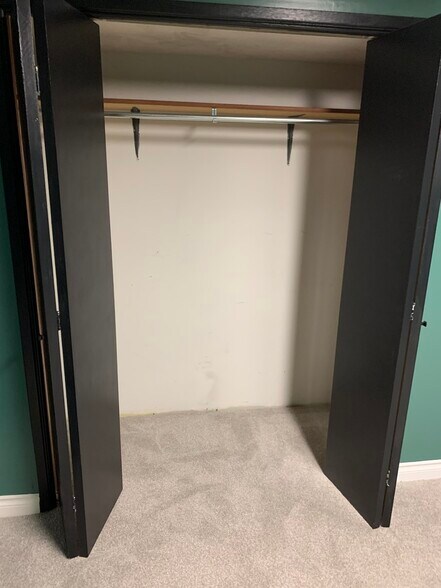 Downstairs bedroom closet - 3224 E 21st Ave