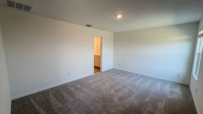 Building Photo - Just Built | Spacious Layout | Private Backyard Retreat