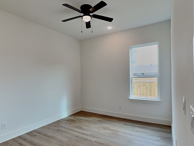 Building Photo - Brand New Modern Luxury with Soaring Ceilings & Designer Finishes!