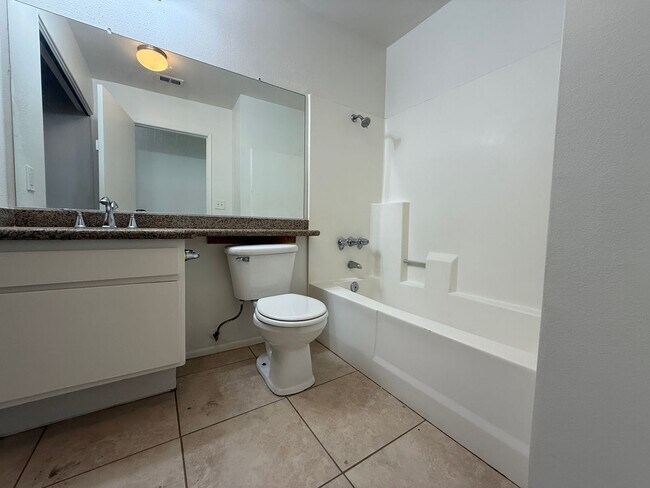 Building Photo - Charming 3-Bedroom Upper-Unit Condo in Can...