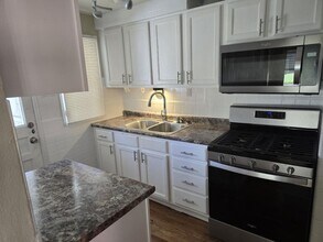 Building Photo - UPDATED 2 Bed 1 Bath  Home with Finished Lower Level & Spacious Backyard in Normandy School District