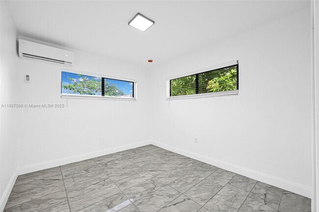 Building Photo - 6432 NE 1st Ct
