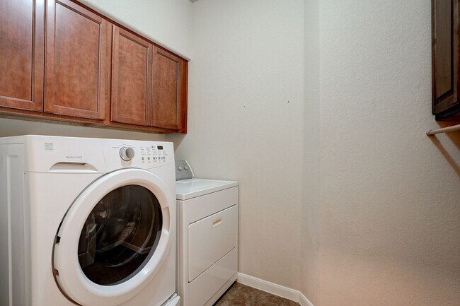 Building Photo - Bright & Roomy 4BR • 2.5BA • Two-Level Living