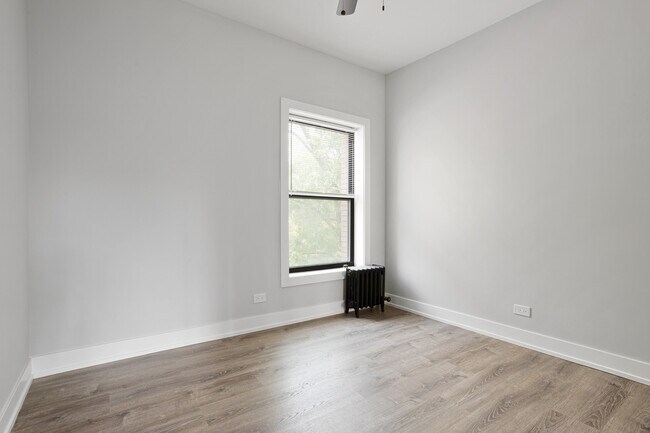 Building Photo - 1243 W Morse Ave