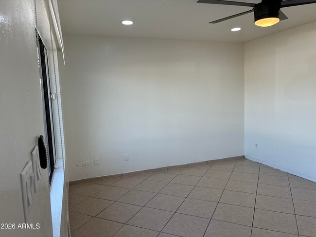 Building Photo - 8819 W Roma Ave