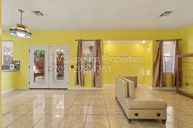 Building Photo - NW!! 4 Bedrooms!!! All Tile and Pergo flooring T/O!! NO Carpet!!! Low Maintenance Desert landscap...