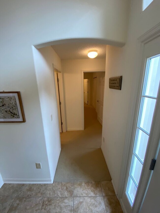 Building Photo - SEASONAL RENTAL. Large 4 Bed + 4 1/2 Baths Home, w/Views of the Jacaranda Golf Course and Lake in...