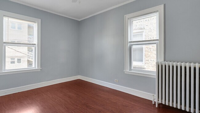 Building Photo - 5714 N Christiana Ave