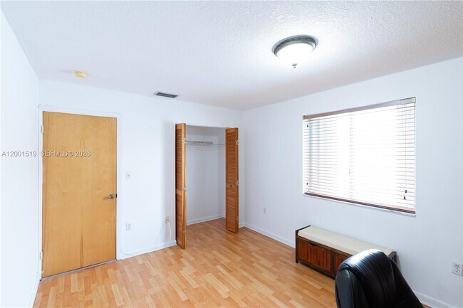 Building Photo - 10017 W Okeechobee Rd