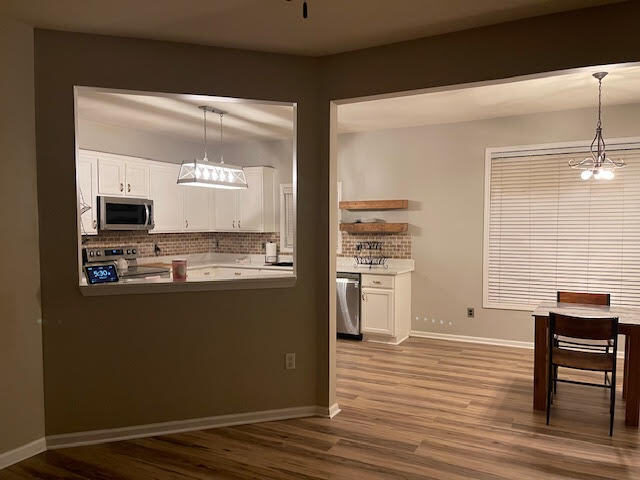 Building Photo - Welcome to this stunning 4-bedroom, 3-bath...