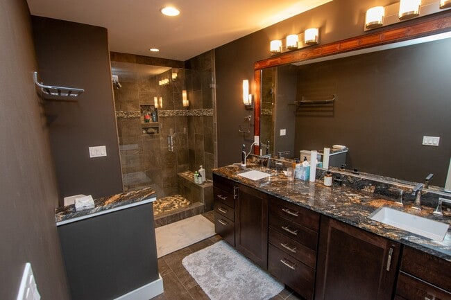 Building Photo - Experience Elevated Living with West Bay V...