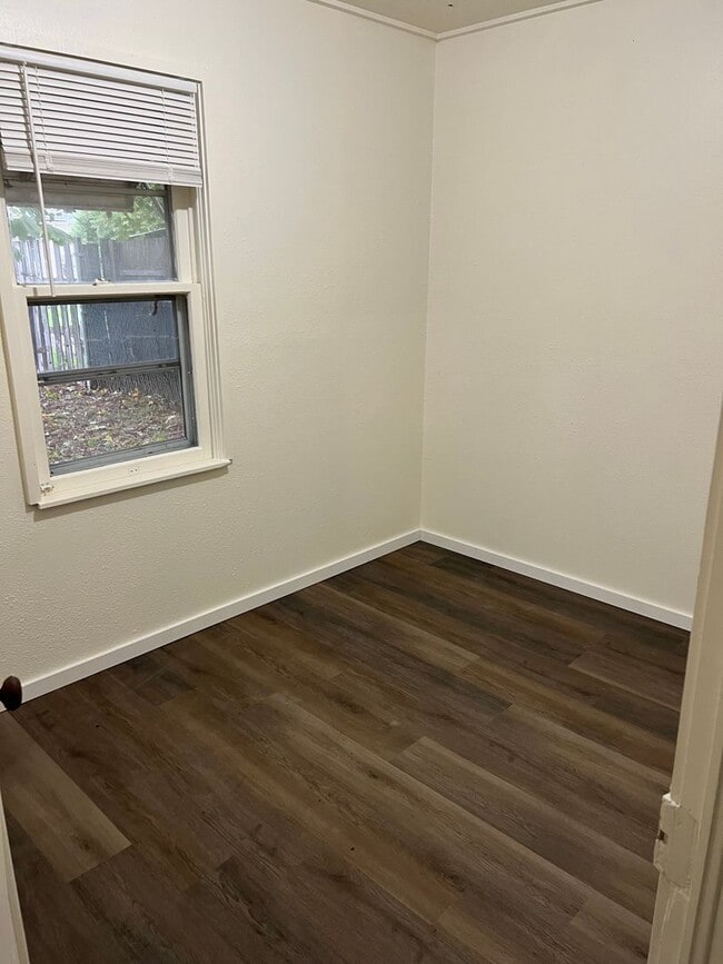 Building Photo - Small 2 bedroom home with carport