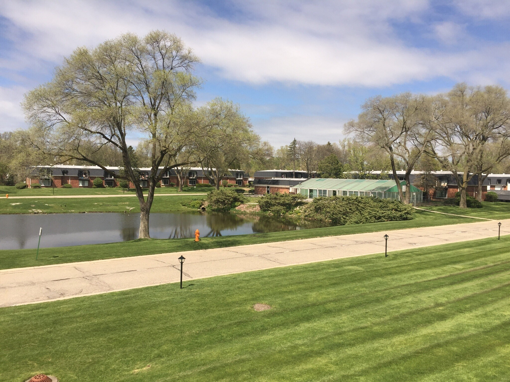 View looking east toward clubhouse and patio - 1814 Colonial Village Way