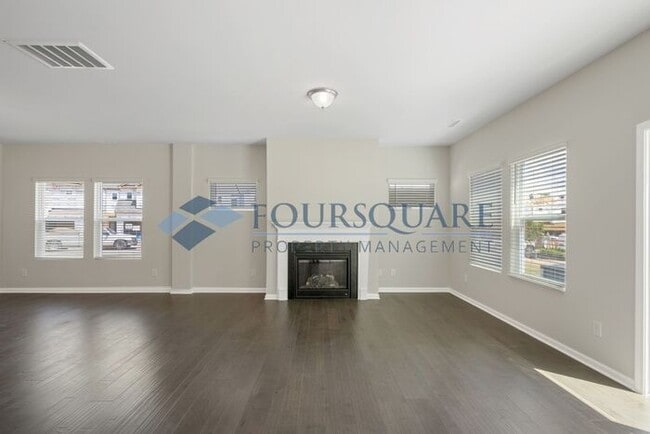 Building Photo - End-Unit Townhome with Loft, Open Floor Plan & Patio, Conveniently Located Near Dining, Shopping,...