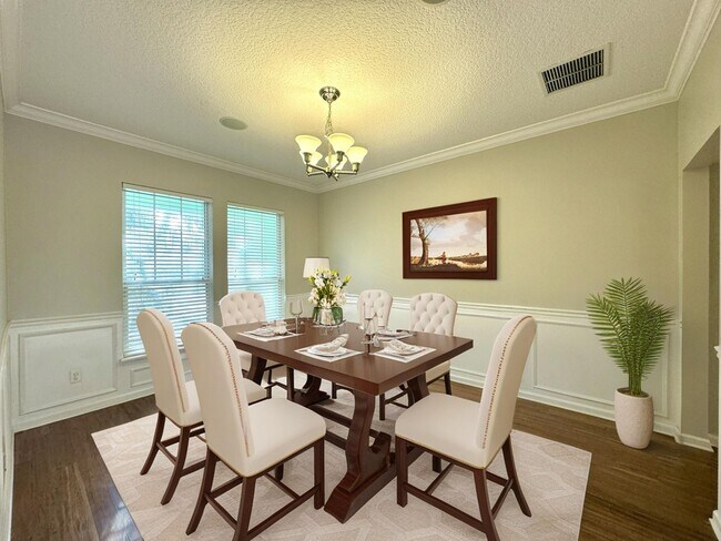 Building Photo - Coastal Charm: Luxurious 4-Bedroom Home in...