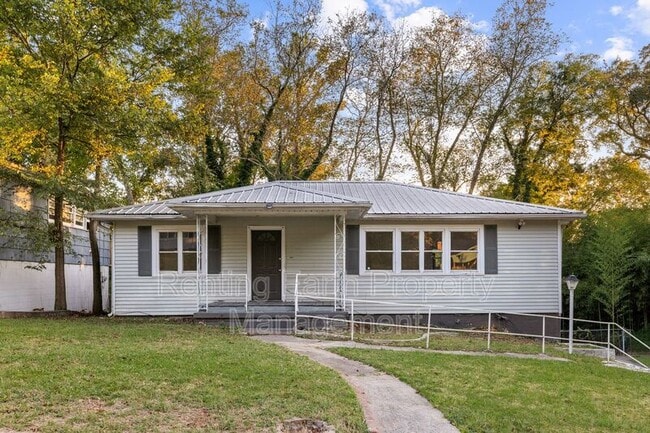 Building Photo - 712 84th St S