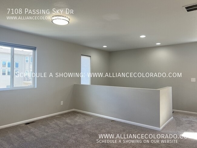 Building Photo - 7108 Passing Sky Dr