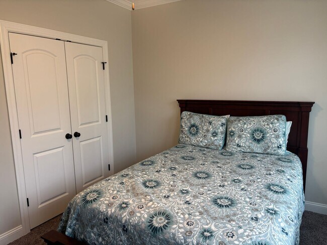 Building Photo - Spacious 4BR/3BA Creekside West Home with Screened Porch, Fenced Yard & 3-Car Garage