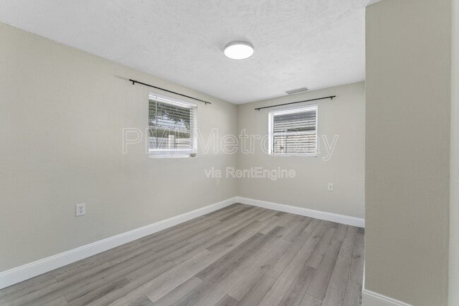 Building Photo - 6121 N Falkenburg Rd