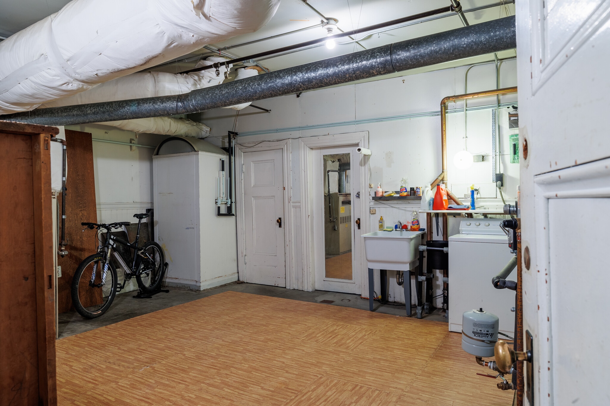 LARGE LAUNDRY ROOM ~ ROOM FOR STORAGE, HOME GYM, WORK SHOP - 2398 Broadway