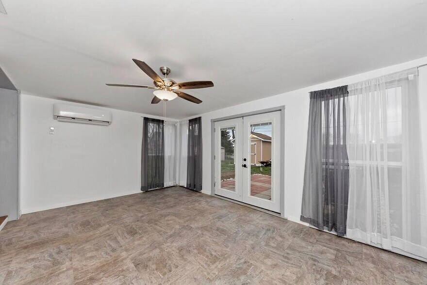 Family room / flex room opens to fenced in back yard - 11 Lawndale Ave