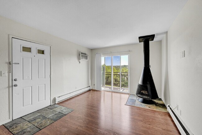 Building Photo - $840.95 with Half Off the first month's rent, 1 Bed, 1 Bath, Condo in Denver with Cozy Fireplace!