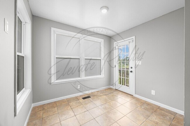 Building Photo - Four Bedroom Two Story with Two Car Garage...