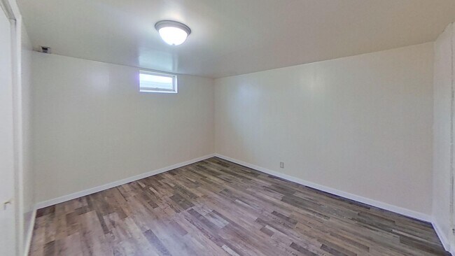 Building Photo - Updated two bedroom ranch duplex with partial basement finish, detached garage, close to mall/sho...