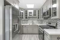 Building Photo - 8613 1/2 W. Olympic Blvd-