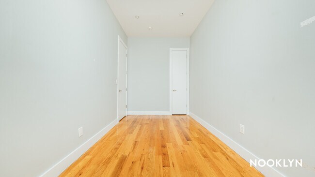 Bed 2 / Closet Front - 1048 Wyckoff Ave