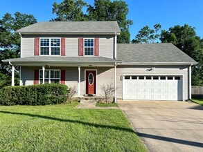 Building Photo - Spacious 3-Bedroom Home with Fenced Yard & Garage!