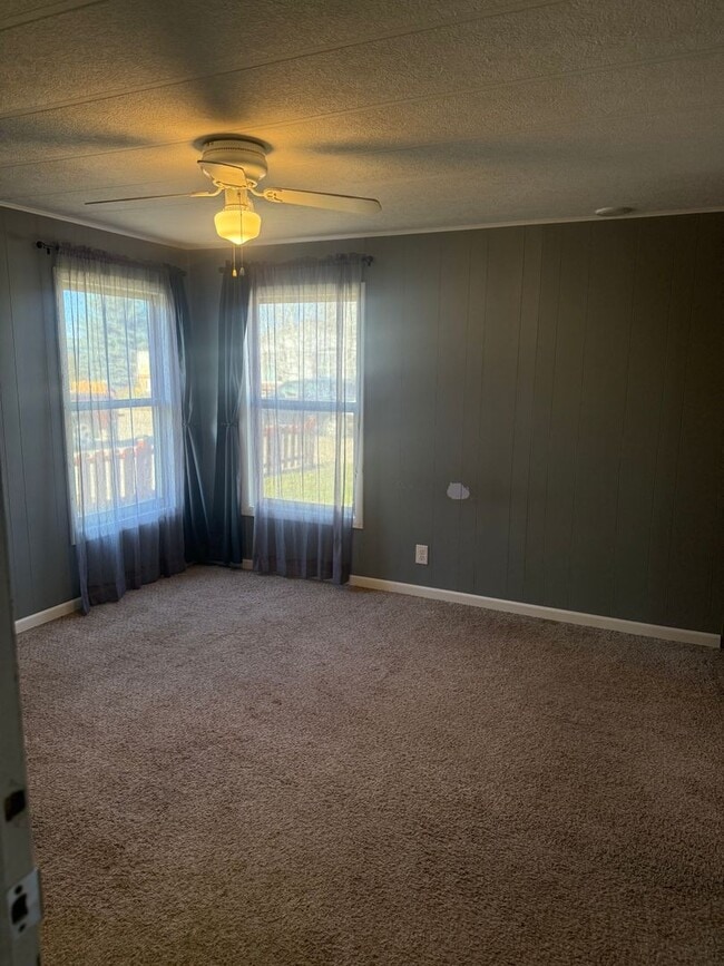 Building Photo - Spacious 3-Bedroom with Storage Shop & Off...