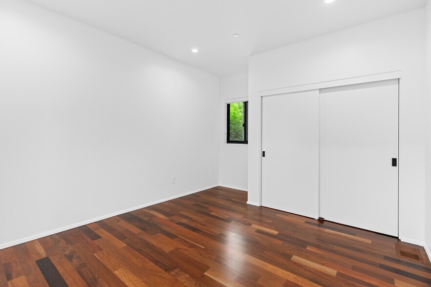 Bedroom 2 with large closet and desk area. - 4638 Del Monte Ave