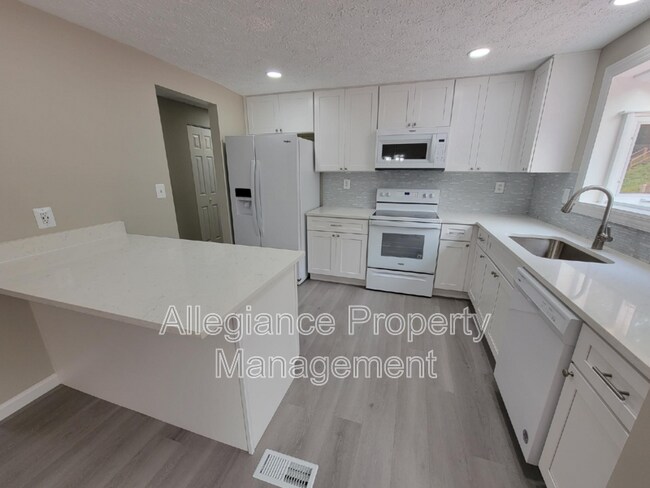 Building Photo - 7598 Springfield Hills Dr