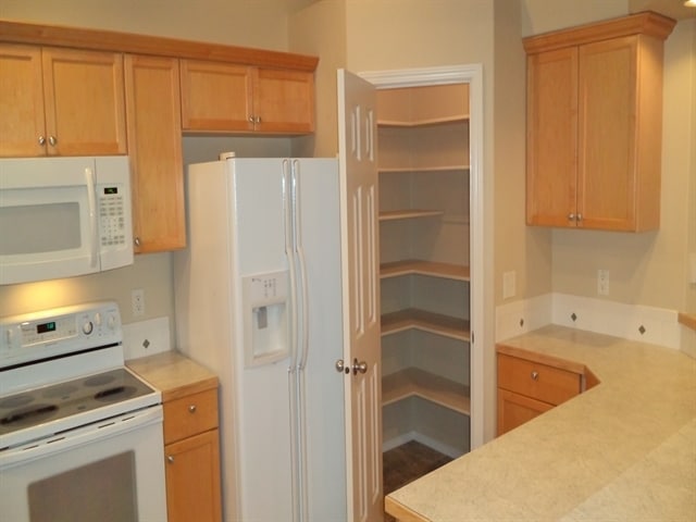 Building Photo - 1439 W Crenshaw St