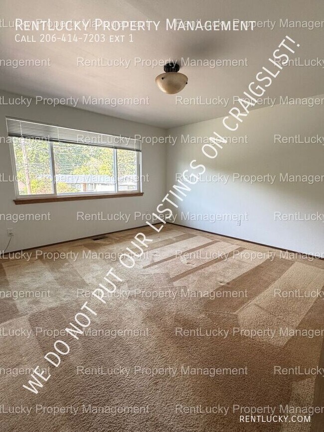 Building Photo - 6718 23rd Ave SW