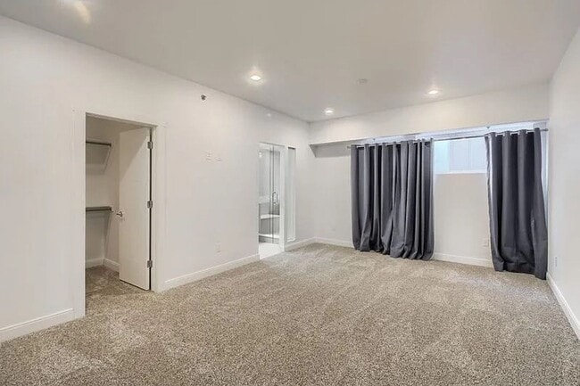 Building Photo - Modern LoHi Living with Rooftop Deck & City Views!!