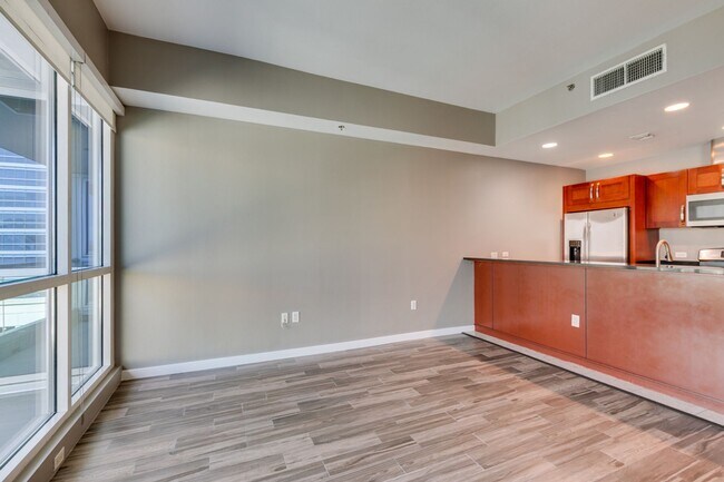 Building Photo - Iconic Strip-View Luxury | Elegant 1BR + Den High-Rise Residence