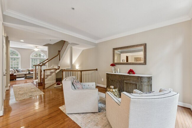 Building Photo - Discover this stunning four-level townhous...