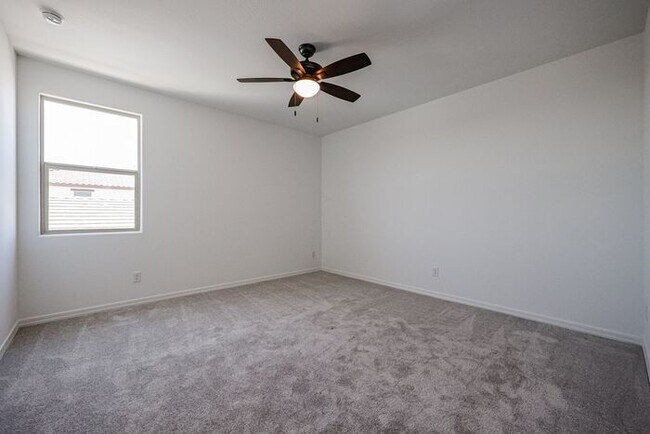 Building Photo - HOME IN LAVEEN! 4 BED 3.5 BA 3 CAR GARAGE!...