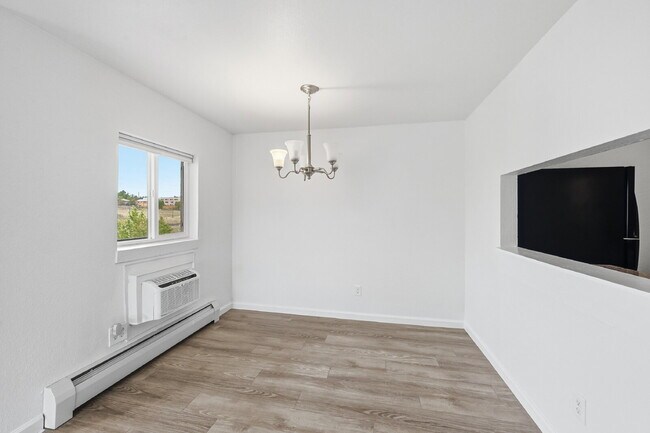 Building Photo - $1,440.95 with $300 Off the first month's rent,  2 Beds - 1 Bath, Condo in Denver with Granite Co...