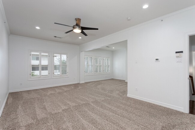 Building Photo - Gorgeous Mediterranean-style condo located...