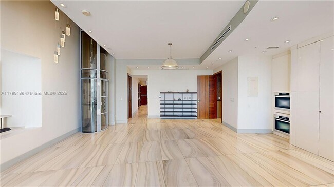 Building Photo - 18201 Collins Ave